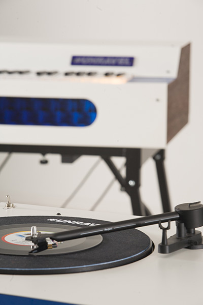 #UNRAVEL Record Player with Organ in background