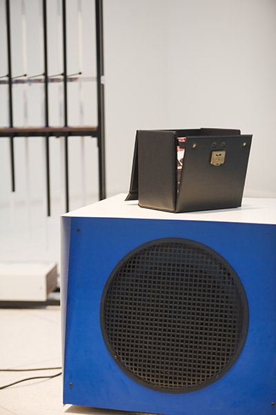 #UNRAVEL Speaker with Record Box and Chimes in background
